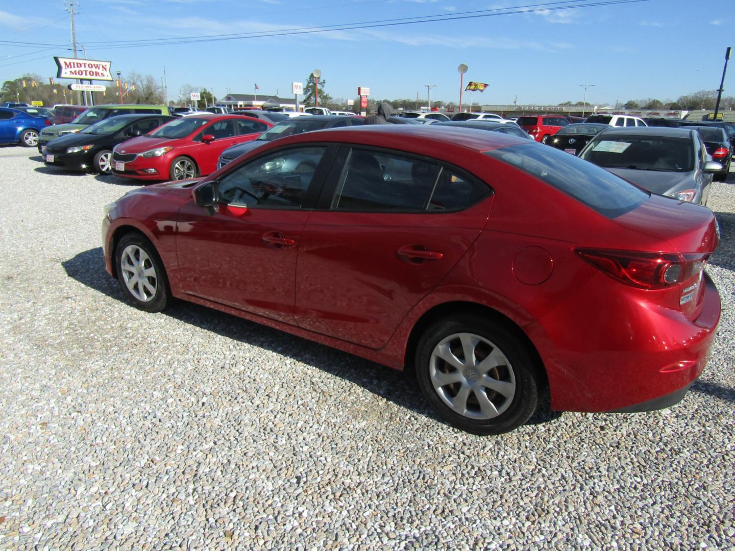 2016 Red Mazda MAZDA3 i Sport AT 4-Door (JM1BM1T74G1) with an 2.0L L4 DOHC 16V engine, Automatic transmission, located at 15016 S Hwy 231, Midland City, AL, 36350, (334) 983-3001, 31.306210, -85.495277 - Photo#5